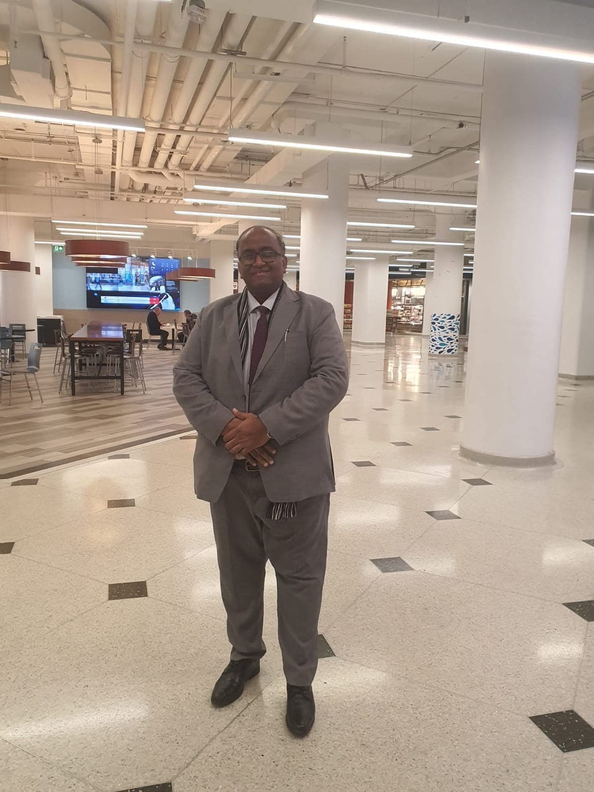 Ghulam Shabbir Babar in a modern office atrium
