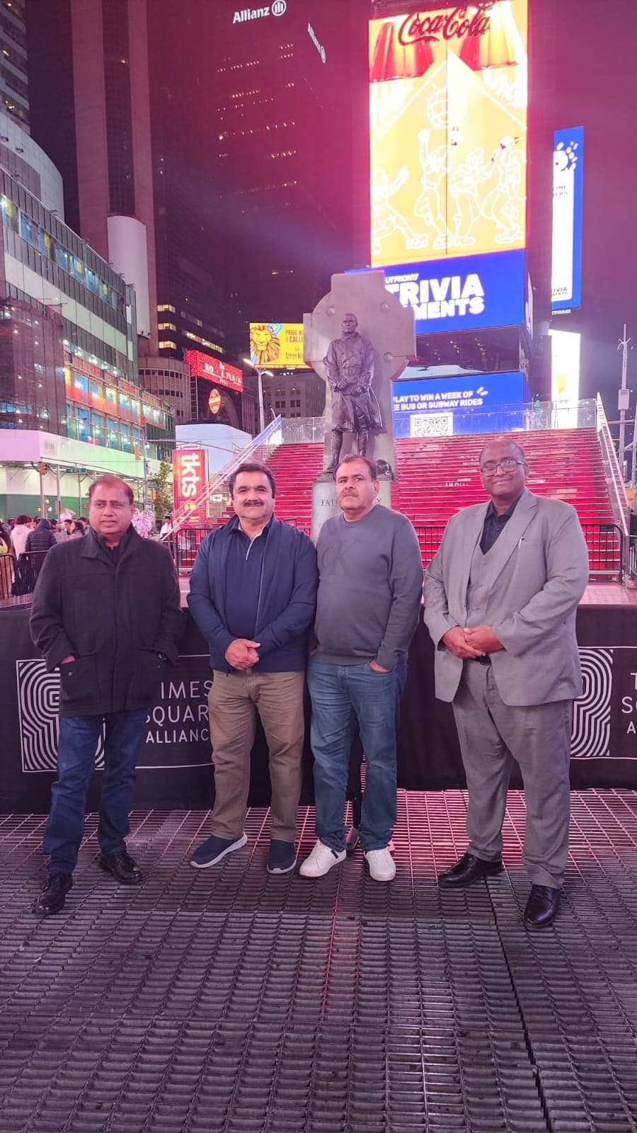 Ghulam Shabbir Babar with colleagues in Times Square, New York