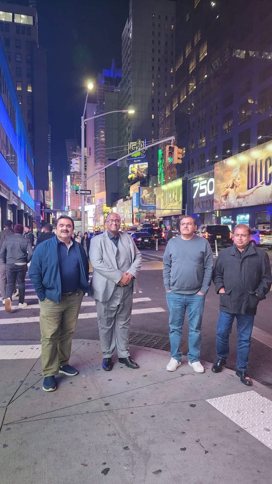 Ghulam Shabbir Babar with colleagues in midtown New York