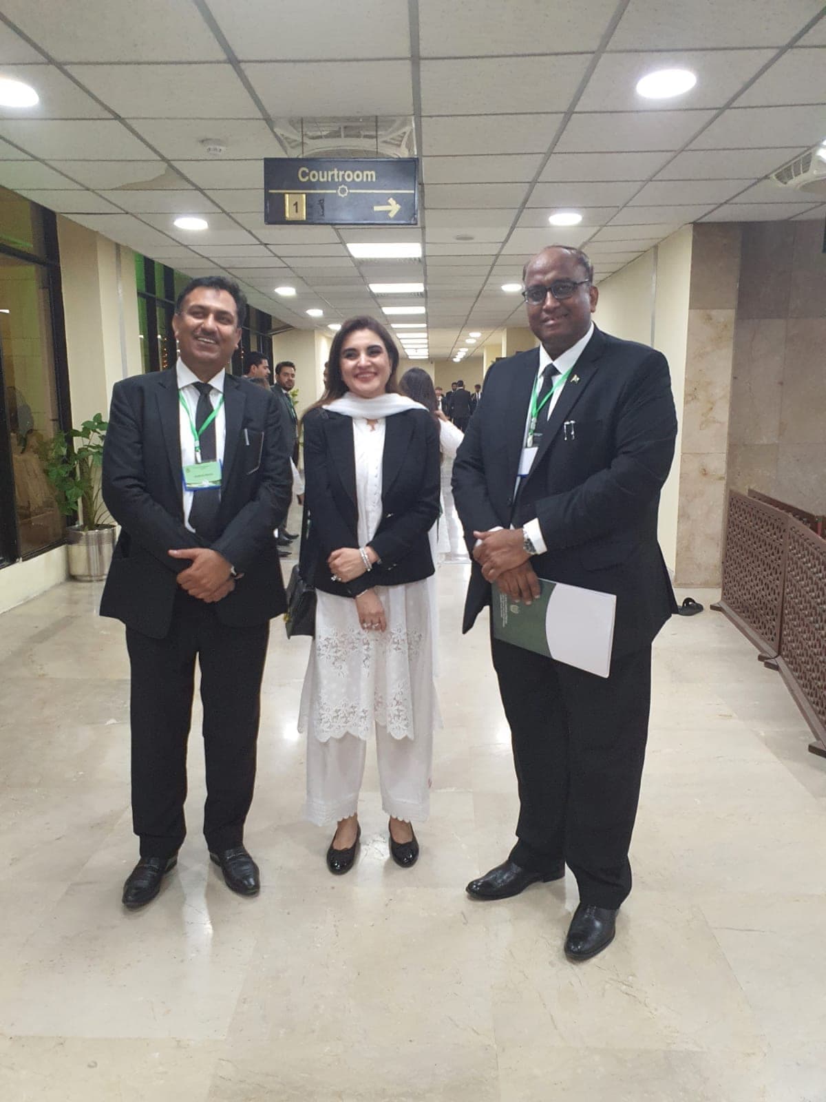 Ghulam Shabbir Babar with colleagues