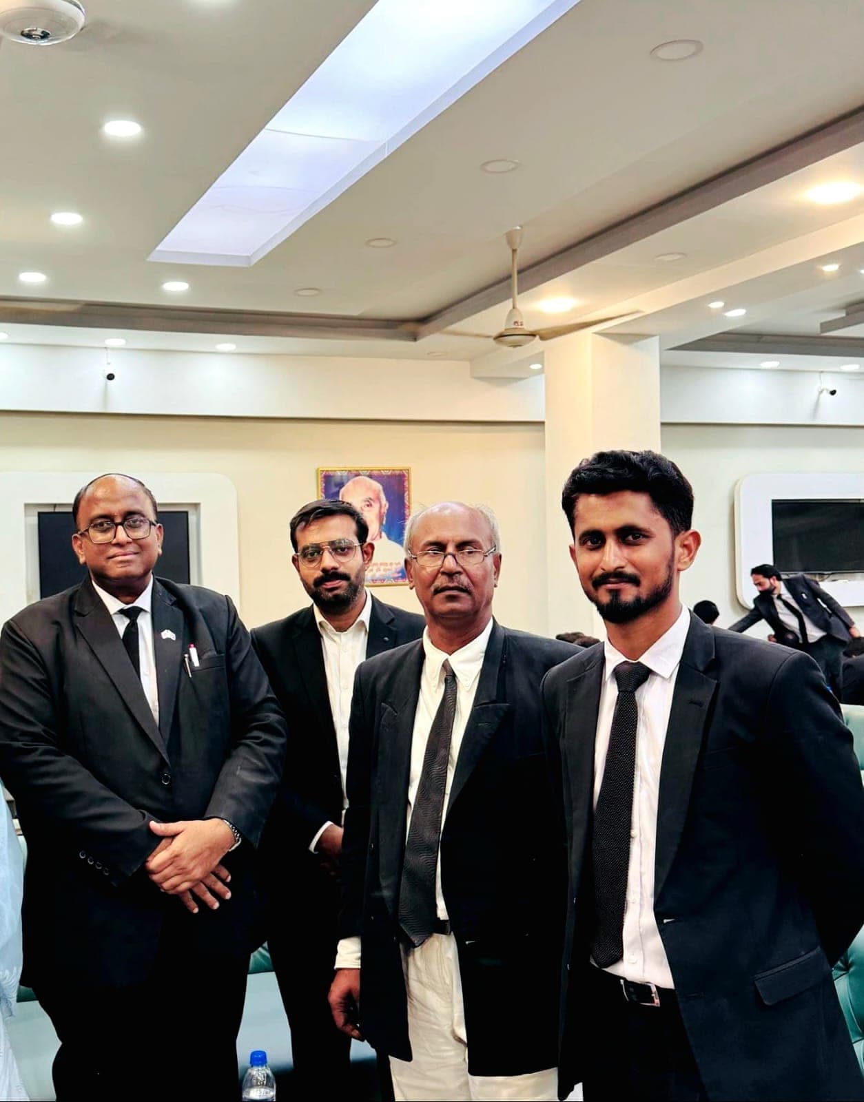 Ghulam Shabbir Babar with colleagues